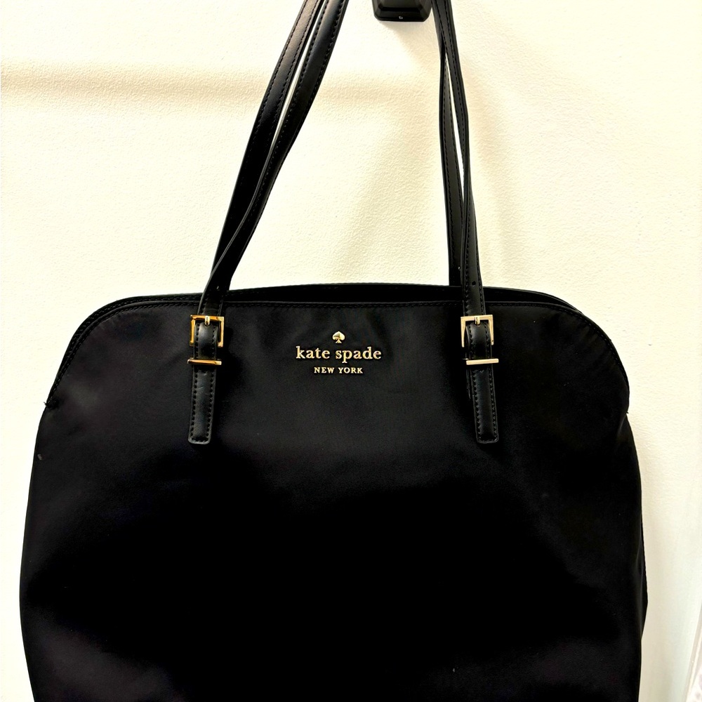 Kate Spade large bag. Nylon with genuine leather handles. Gold accent.